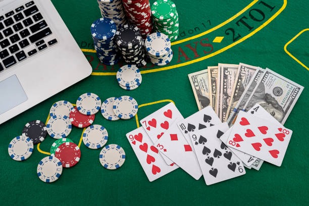 Multi camera live dealer studio with baccarat and roulette tables